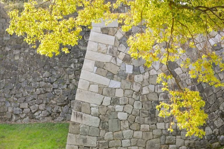 leaning retaining wall repair by BAKR Masonry