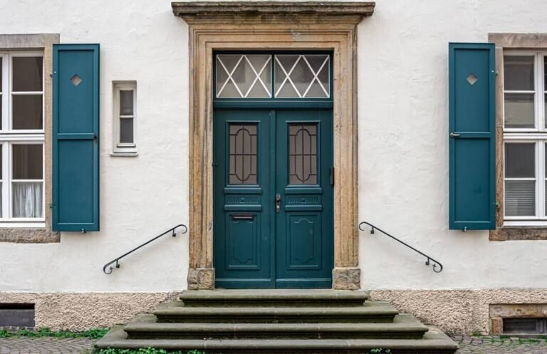 Front entrance masonry with steps stonework and walkway