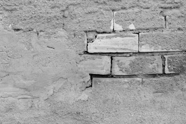 Masonry expansion joints in brick and concrete wall